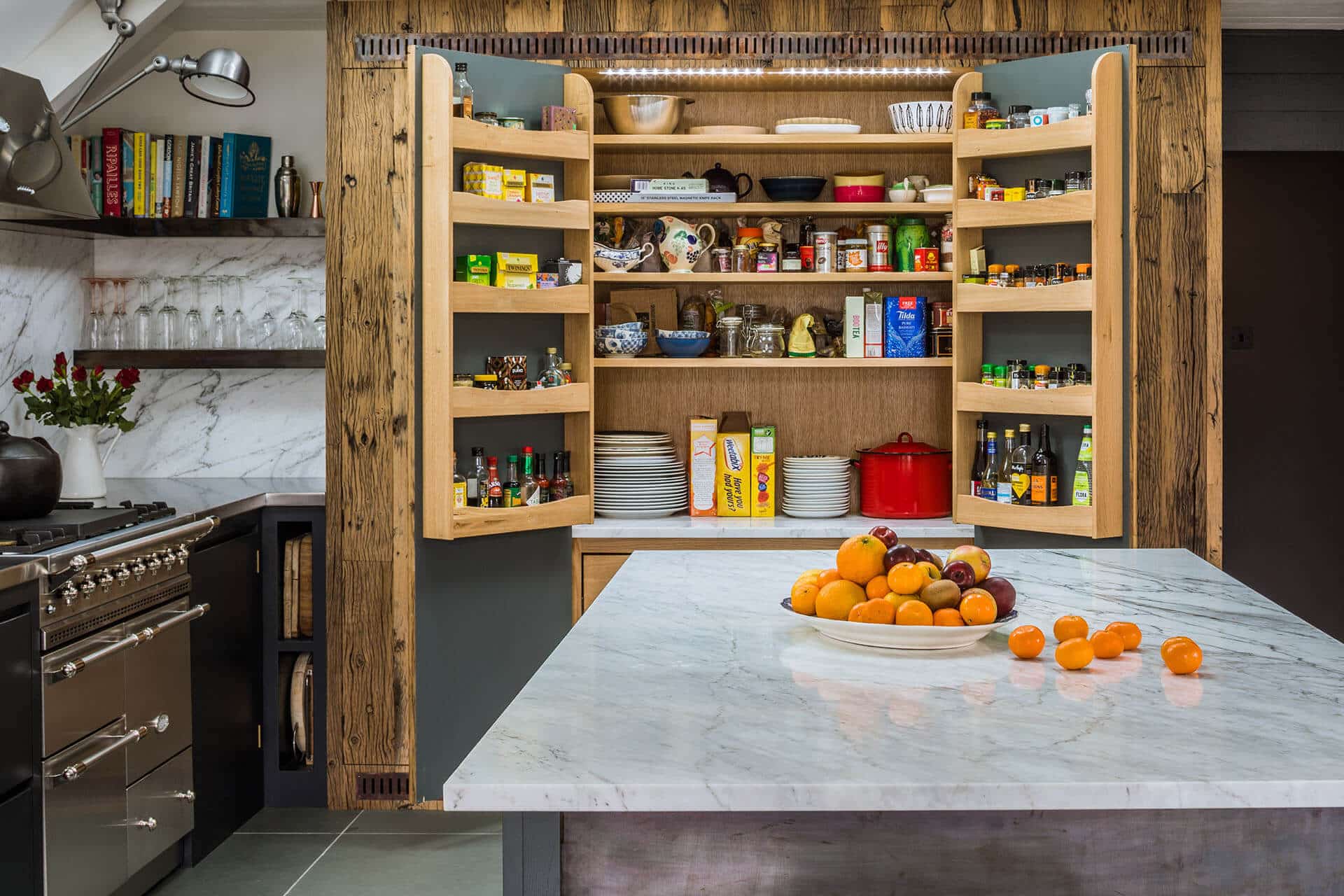 Steel, Marble, Reclaimed Wood Kitchen with extensive double larder with oak internals and oak spice racks and a marble cold shelf.