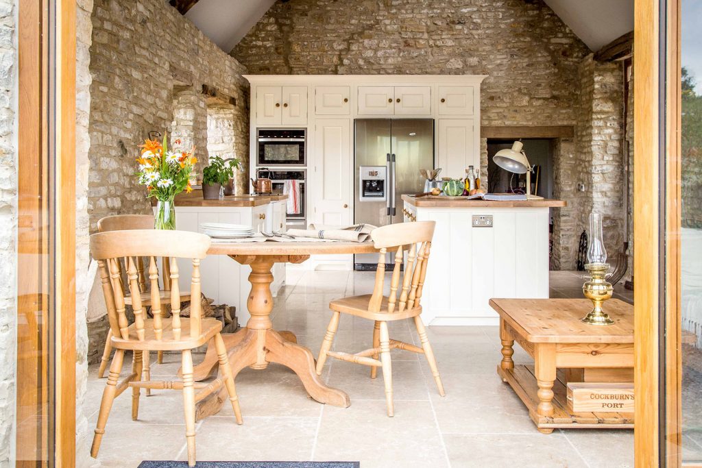 Traditional Country Kitchen with glazed patio doors